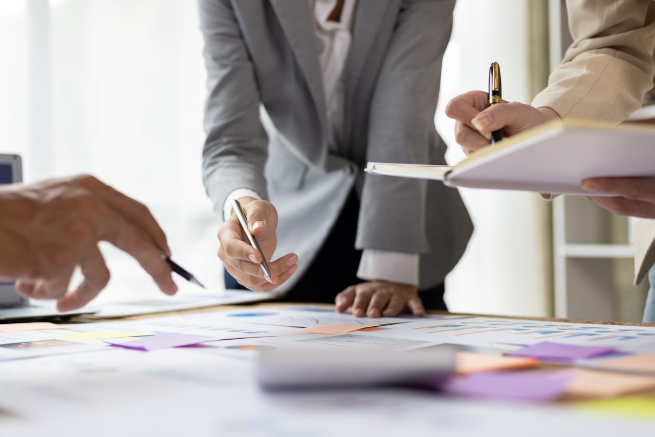 Business meeting, Business people meet with colleagues in the organization discussing investment planning start-up projects. Analysis marketing growth chart and make business plan.