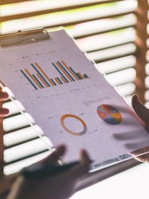 Group of businessman working and discussing about business data together in office